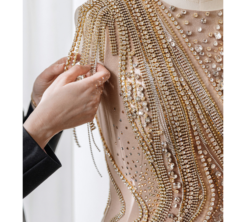 Dress with applied Preciosa crystals and cupchains from our deadstock initiative